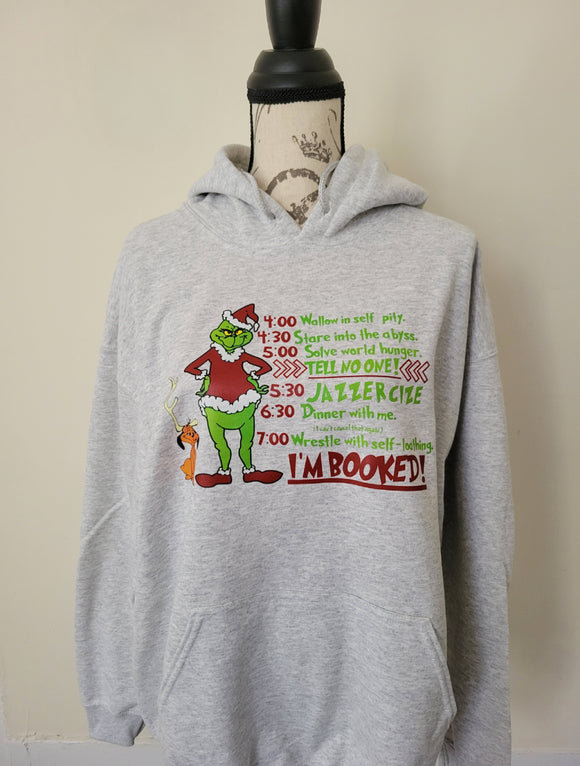 The grinch im booked sweater